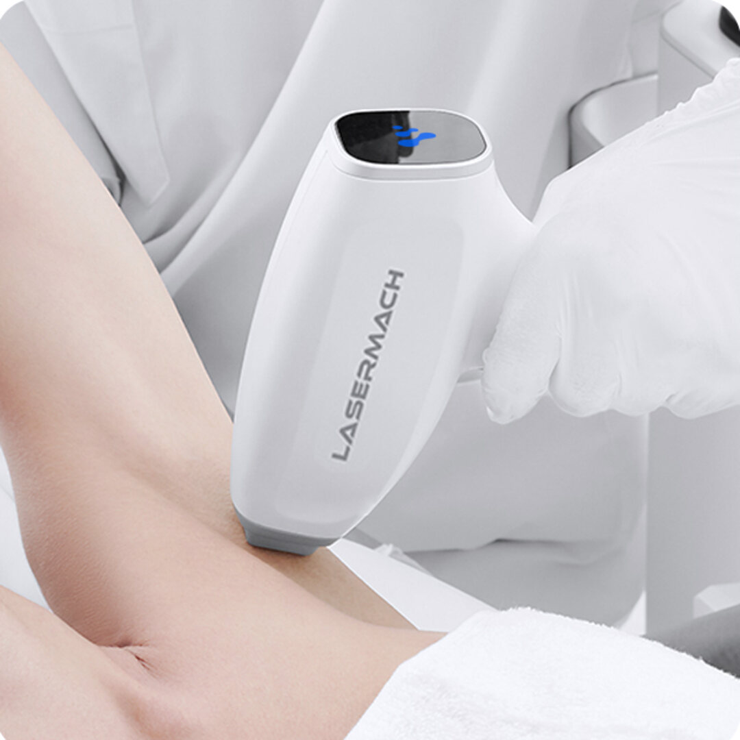 LaserMach handpiece applied to the axilla during a hair removal session
